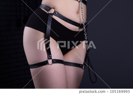 Shot of womans hips in bandage belt Shot of womans hips in bandage belt 105169993
