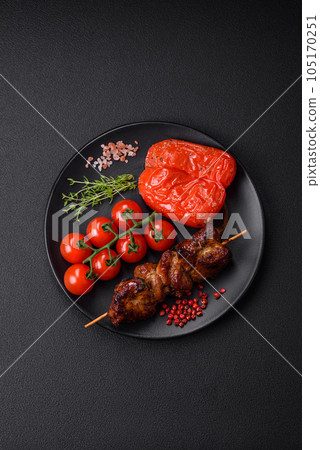 Delicious grilled chicken, turkey or pork skewers with salt, spices and herbs Delicious grilled chicken, turkey or pork skewers with salt, spices and herbs 105170251