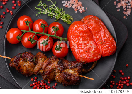 Delicious grilled chicken, turkey or pork skewers with salt, spices and herbs 105170259