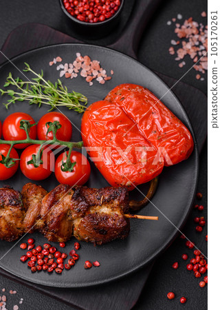 Delicious grilled chicken, turkey or pork skewers with salt, spices and herbs Delicious grilled chicken, turkey or pork skewers with salt, spices and herbs 105170261