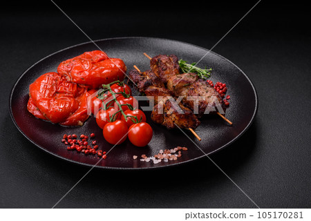 Delicious grilled chicken, turkey or pork skewers with salt, spices and herbs 105170281