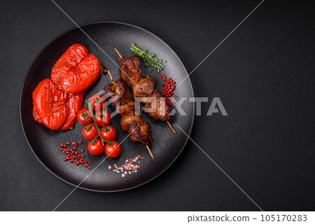 Delicious grilled chicken, turkey or pork skewers with salt, spices and herbs 105170283