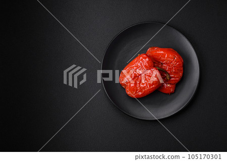 Delicious juicy grilled peppers with spices and herbs Delicious juicy grilled peppers with spices and herbs 105170301