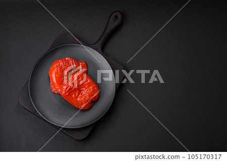 Delicious juicy grilled peppers with spices and herbs Delicious juicy grilled peppers with spices and herbs 105170317
