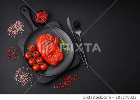 Delicious juicy grilled peppers with spices and herbs Delicious juicy grilled peppers with spices and herbs 105170322
