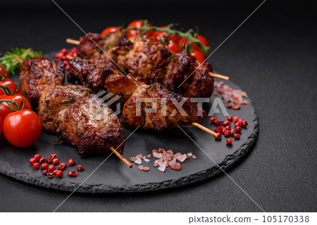 Delicious grilled chicken, turkey or pork skewers with salt, spices and herbs Delicious grilled chicken, turkey or pork skewers with salt, spices and herbs 105170338