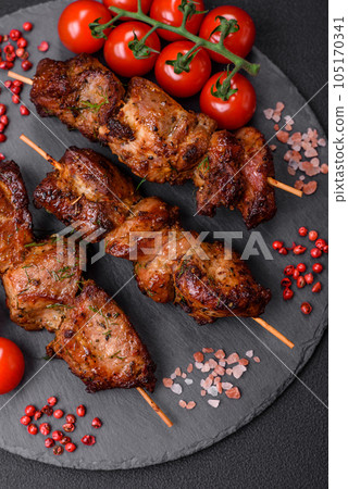 Delicious grilled chicken, turkey or pork skewers with salt, spices and herbs Delicious grilled chicken, turkey or pork skewers with salt, spices and herbs 105170341