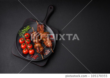 Delicious grilled chicken, turkey or pork skewers with salt, spices and herbs 105170355