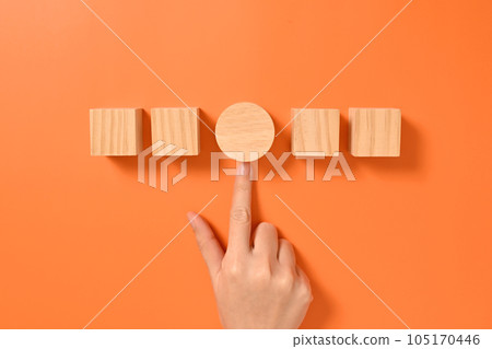 Hand with wooden cubes mock up on abstract background, Copy space, Wooden blocks with copy space for text or symbols, Background with copy space Hand with wooden cubes mock up on abstract background, Copy space, Wooden blocks with copy space for text or symbols, Background with copy space 105170446