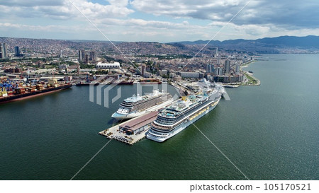 A view of the 3 cruise ships arriving at the port of Izmir a view of the city from the air. A view of the 3 cruise ships arriving at the port of Izmir a view of the city from the air. 105170521