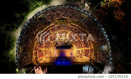 aerial view with drone of people watching concert in open air theater 105170528