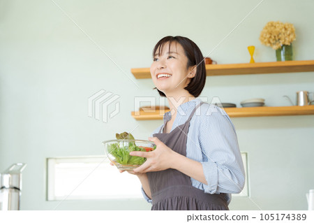 photo of woman with salad 105174389