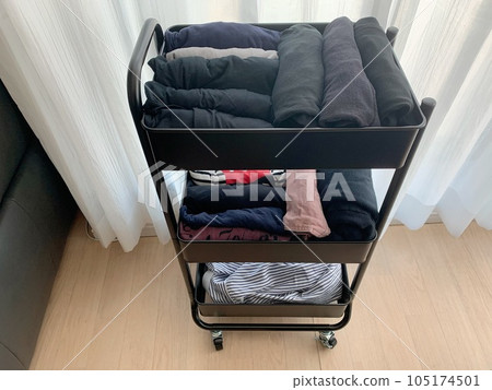Clothes in a caster wagon 105174501