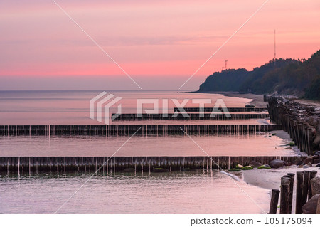 View on beach of Baltic sea in Svetlogorsk at sunrise. Kaliningrad region. Russia 105175094