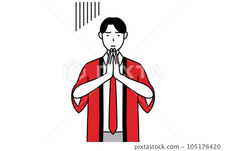 一名身穿紅色法衣的男性售貨員雙手合十在身前道歉 一名身穿紅色法衣的男性售貨員雙手合十在身前道歉 105176420