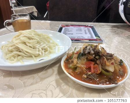 Lagman is a noodle dish from Central Asia. 105177763