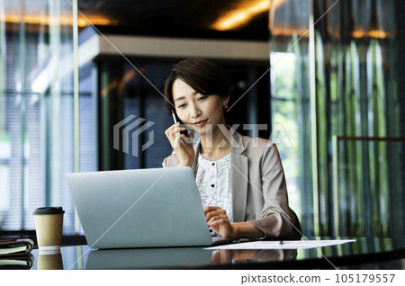Female business computer career woman smartphone Female business computer career woman smartphone 105179557