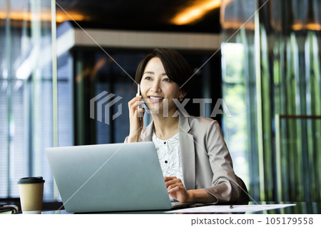 Female business computer career woman smartphone Female business computer career woman smartphone 105179558