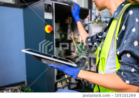 Business owner engineer managing and checking work at factory Business owner engineer managing and checking work at factory 105181269