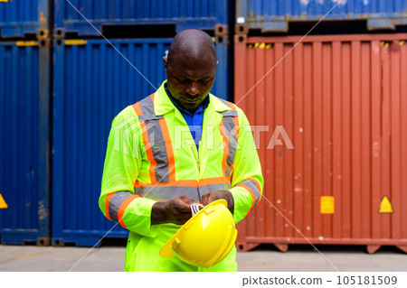 Warehouse engineer worker working at industrial container yard Warehouse engineer worker working at industrial container yard 105181509