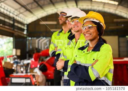 Group of technicians engineers workers posing to camera with smile 105181570