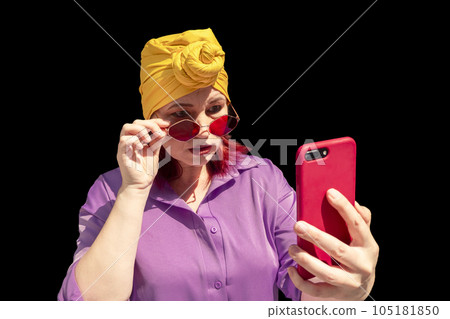 Happy adult asian with extravagant style with phone Happy adult asian with extravagant style with phone 105181850