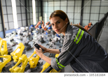Maintenance engineer worker working with robotic machine automation 105181884