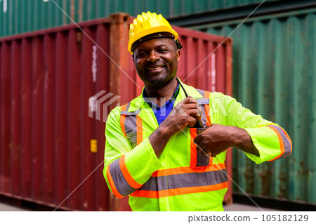 Warehouse engineer worker checking and working at industrial container station 105182129