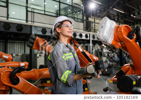 Maintenance engineer worker working with robotic machine automation Maintenance engineer worker working with robotic machine automation 105182169