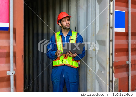Warehouse engineer worker working at industrial container yard 105182469