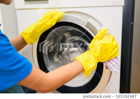 Happy woman cleaning house, Housekeeping and cleaning service, People doing housework at home 105182487