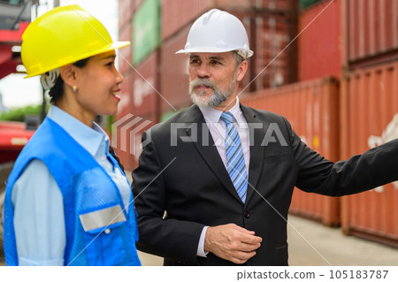 Warehouse engineer worker working at industrial container yard 105183787
