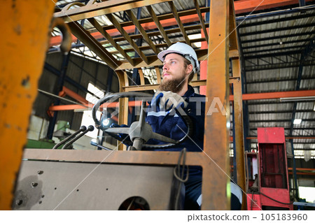 Mechanical engineer repairing engine machine at factory Mechanical engineer repairing engine machine at factory 105183960