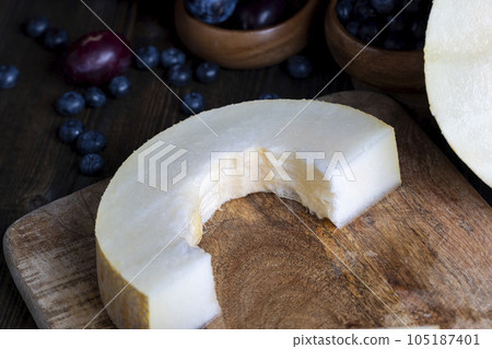 Ripe delicious melon during dessert cooking Ripe delicious melon during dessert cooking 105187401