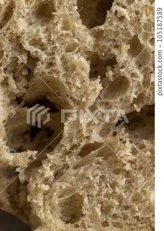A loaf of bread made of wheat and rye flour cut into pieces A loaf of bread made of wheat and rye flour cut into pieces 105187589