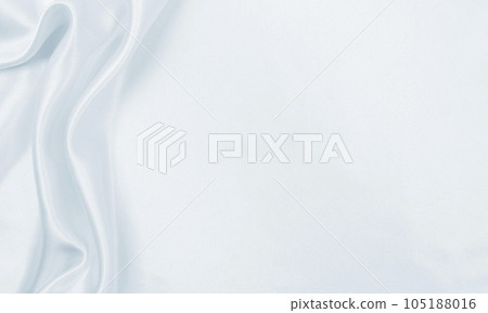 Smooth elegant grey silk or satin luxury cloth as wedding background. Luxurious Christmas background or New Year background design Smooth elegant grey silk or satin luxury cloth as wedding background. Luxurious Christmas background or New Year background design 105188016