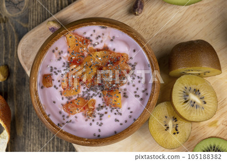 fresh yogurt with berries and fruits with red oranges fresh yogurt with berries and fruits with red oranges 105188382