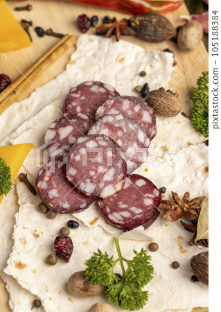 Sliced fresh pork sausage, close up Sliced fresh pork sausage, close up 105188384