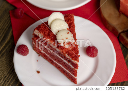 Red cake with cream and raspberry flavor 105188782