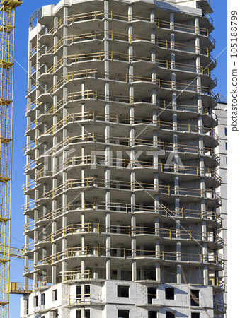 close-up of a part of a multi-storey residential building made of concrete and metal close-up of a part of a multi-storey residential building made of concrete and metal 105188799