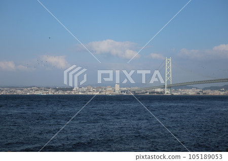 Akashi Kaikyo Bridge and Kobe city seen from Awaji Island Akashi Kaikyo Bridge and Kobe city seen from Awaji Island 105189053