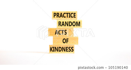 Practice random kind of kindness symbol. Concept words Practice random kind of kindness on wooden block. Beautiful white table white background. Business practice kindness concept. Copy space. 105190140