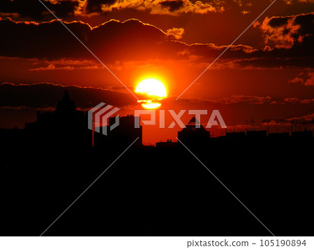 Autumn red sunset with a purple sky Autumn red sunset with a purple sky 105190894