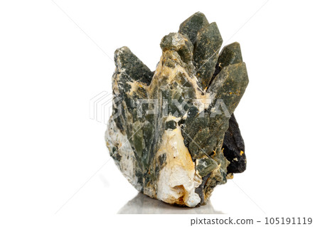 Macro mineral stone Quartz Hedenbergite Prase on ilvite on a white background Macro mineral stone Quartz Hedenbergite Prase on ilvite on a white background 105191119