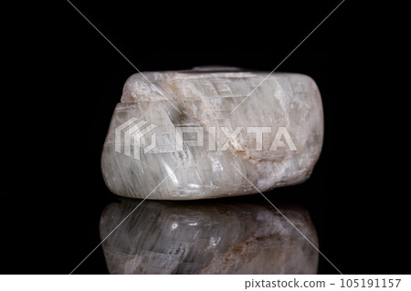 Macro mineral stone Moonstone on black background 105191157