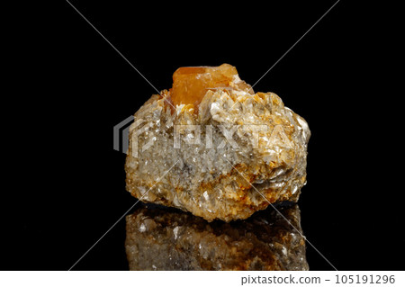 Macro Mineral Stone Sheelit on a black background Macro Mineral Stone Sheelit on a black background 105191296