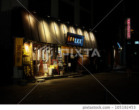 Izakaya storefront at night 105192453
