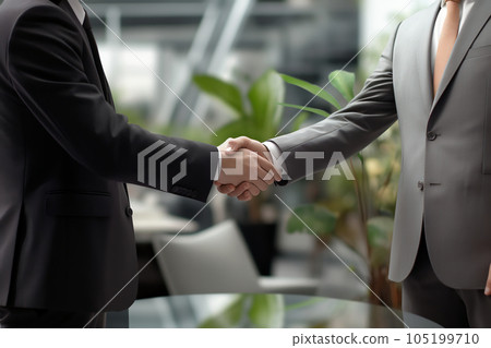 The hand of the businessman shaking hands 105199710