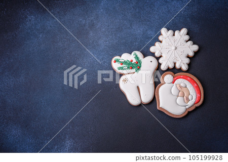 Beautiful festive Christmas gingerbread made by hand with decoration elements 105199928