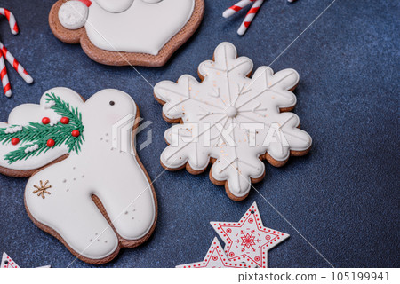 Beautiful festive Christmas gingerbread made by hand with decoration elements 105199941